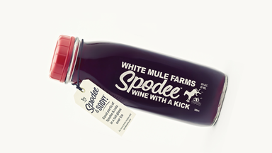 Spodee Homemade Country Wine in a Milk Bottle